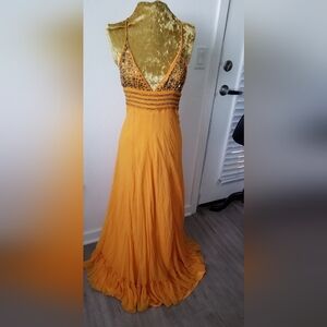 Silk summer dresses with beaded bust.